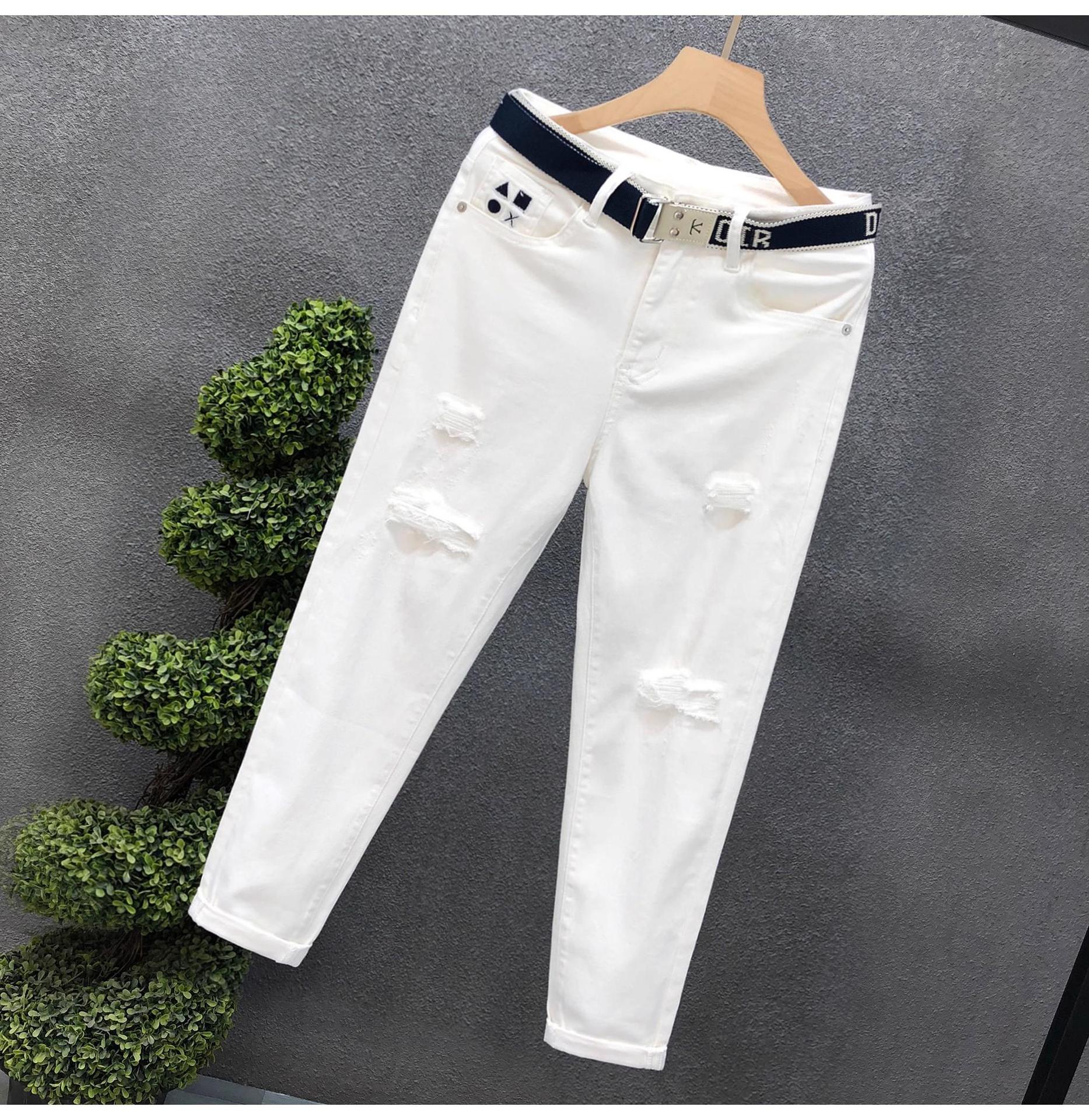 Jeans slim fit uomo denim strappato alla moda per l'estate_voghion.com