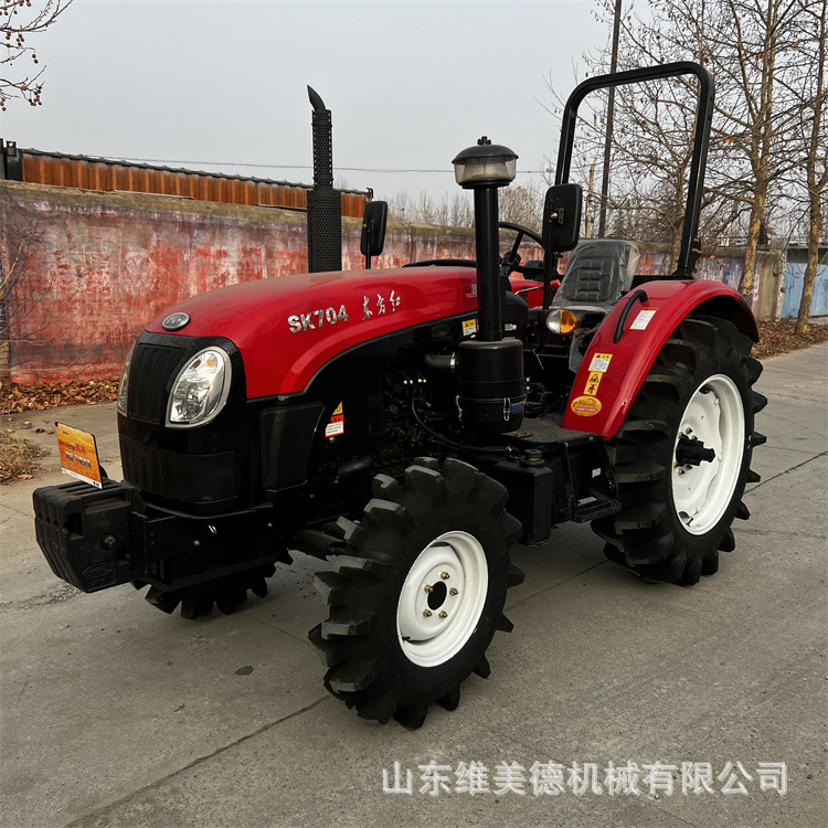 东方红SK704农用拖拉机 四驱高配耕地机 水旱两用旋耕机