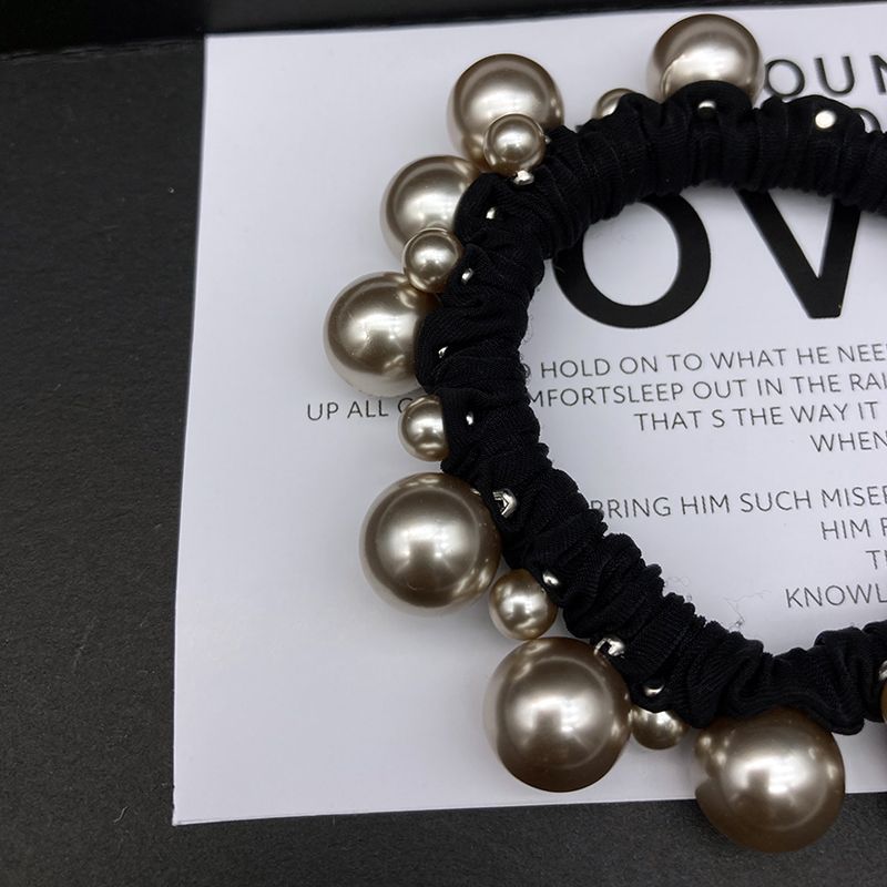 2025 nuevo estilo de cuerda de cabeza simple anillo de pelo de perlas anillo de intestino grande temperamento de alta elasticidad correa gruesa cuerda de pelo de mujer