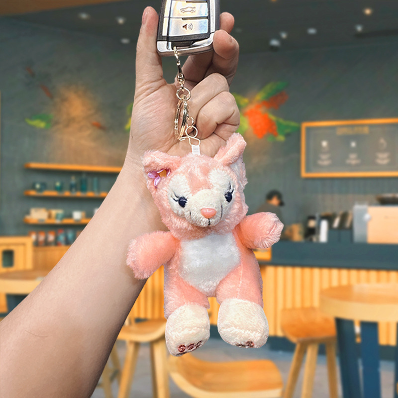 かわいいぬいぐるみのピンクのキツネのキーホルダー卸売りはアニメの人形のキーホルダーのカップルのバッグのペンダントを飾ります。|undefined