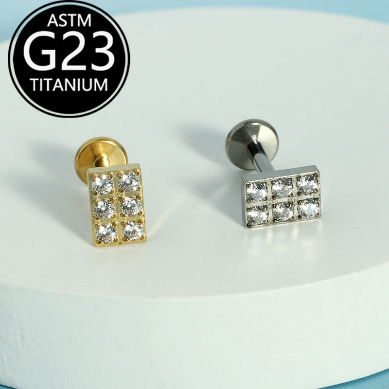 Silver pointed spike labret stud material detail