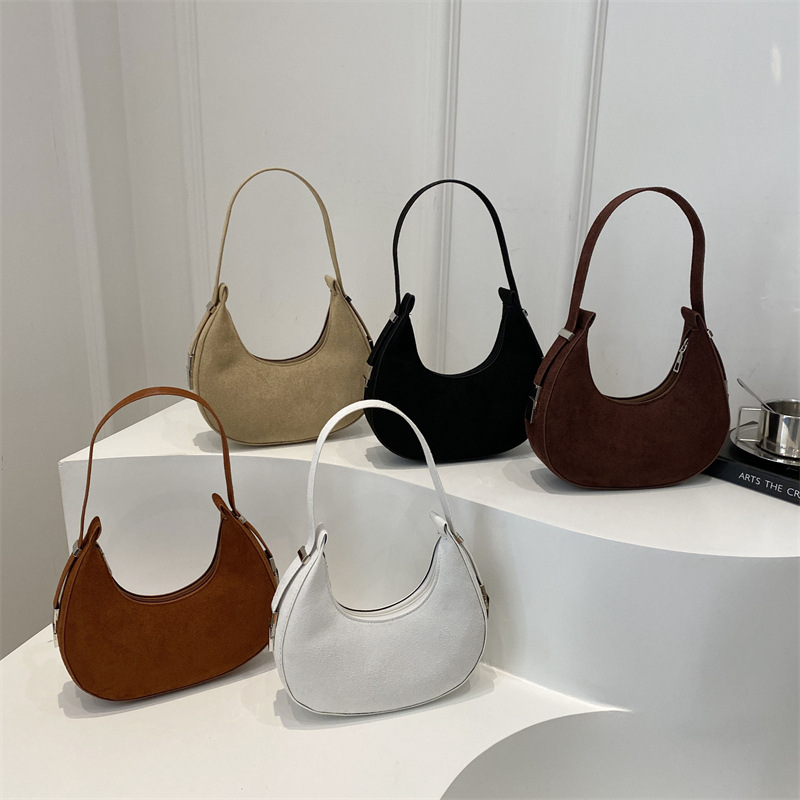 Bolsa de media luna francesa nicho para mujeres 2025 verano nuevo estilo de moda de color sólido esmerilado textura de moda bolso de hombro bolso debajo de la axila