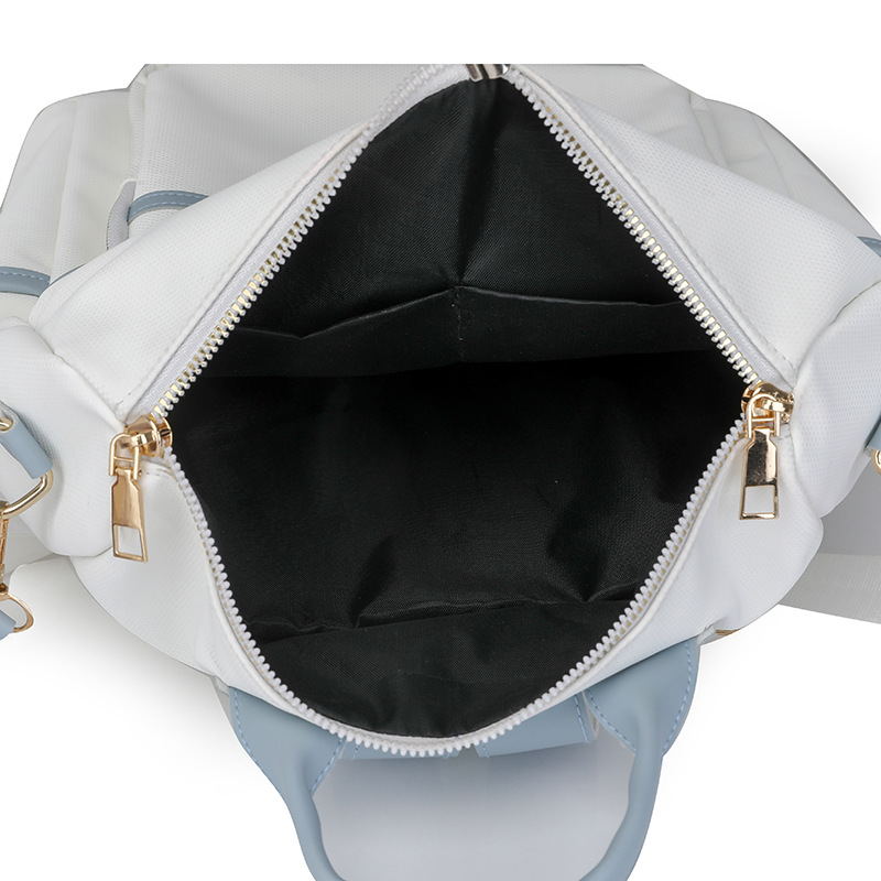 Mochila para mujer Mochila multiusos simple de gran capacidad Color sólido Moda ligera Bolsa de cuero de viaje al por mayor