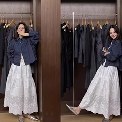 フランスのレトロなレースのハイウエストの刺繍のスカートの女性の春の高級感はゆったりしていて、細い傘のスカートのa字の中で長いスカートを現します。