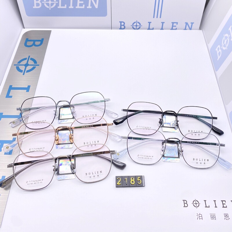 Wholesale 2185 fashion ultra light high quality semi titanium glasses frame ceramic nose support super elastic temple is not easy to decolorize Wholesale 2185 fashion ultra light high quality semi titanium glasses frame ceramic nose support super elastic temple is not easy to decolorize