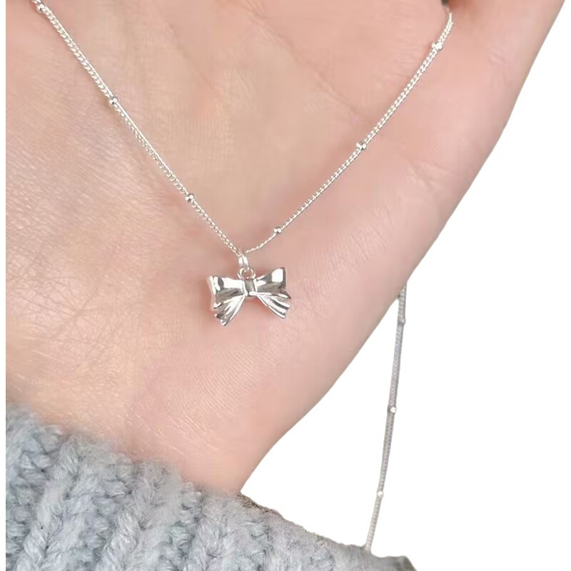 Luz de moda lujo nicho diseño arco colgante collar las mujeres en línea popular clavícula cadena