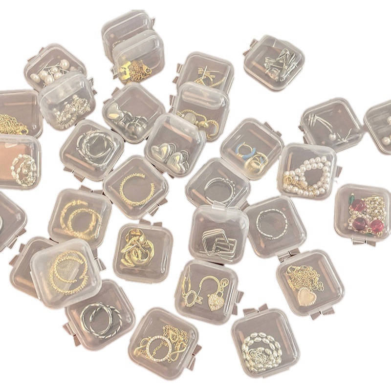 T caja pequeña caja de la píldora de plástico transparente espárragos de La Oreja caja de almacenamiento anillo de la joyería U disco caja de almacenamiento de la tarjeta del teléfono móvil