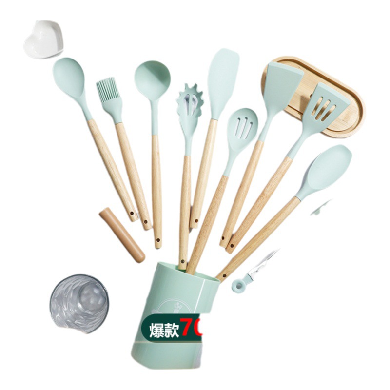 Cuchara de sopa de espátula de silicona transfronteriza Pan antiadherente de 12 piezas espátula de silicona resistente a altas temperaturas traje de cocina de silicona para el hogar al por mayor