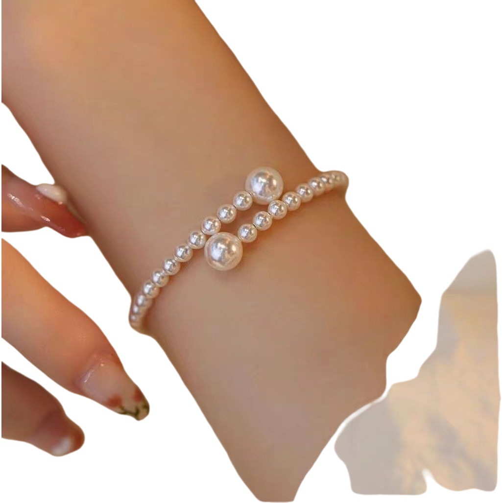 Francés retro perla pulsera Luz de lujo de las mujeres elegante de alto grado nicho diseño simple todo-fósforo de la moda pulsera