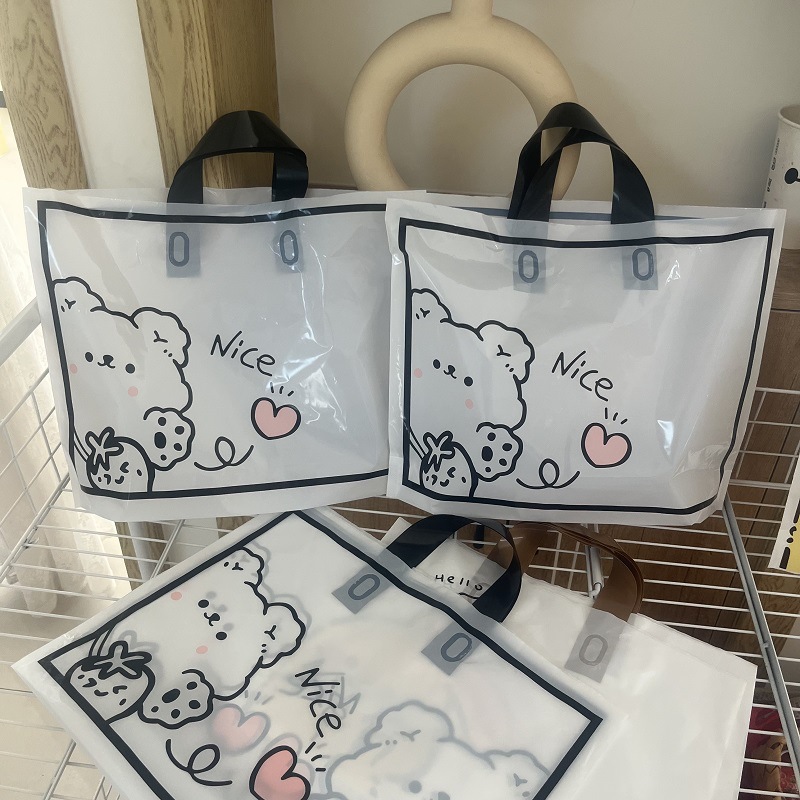 Venta al por mayor lindo Oso de lana nuevo embalaje portátil de plástico bolsa de compras de ropa para niños bolsa de caja de zapatos