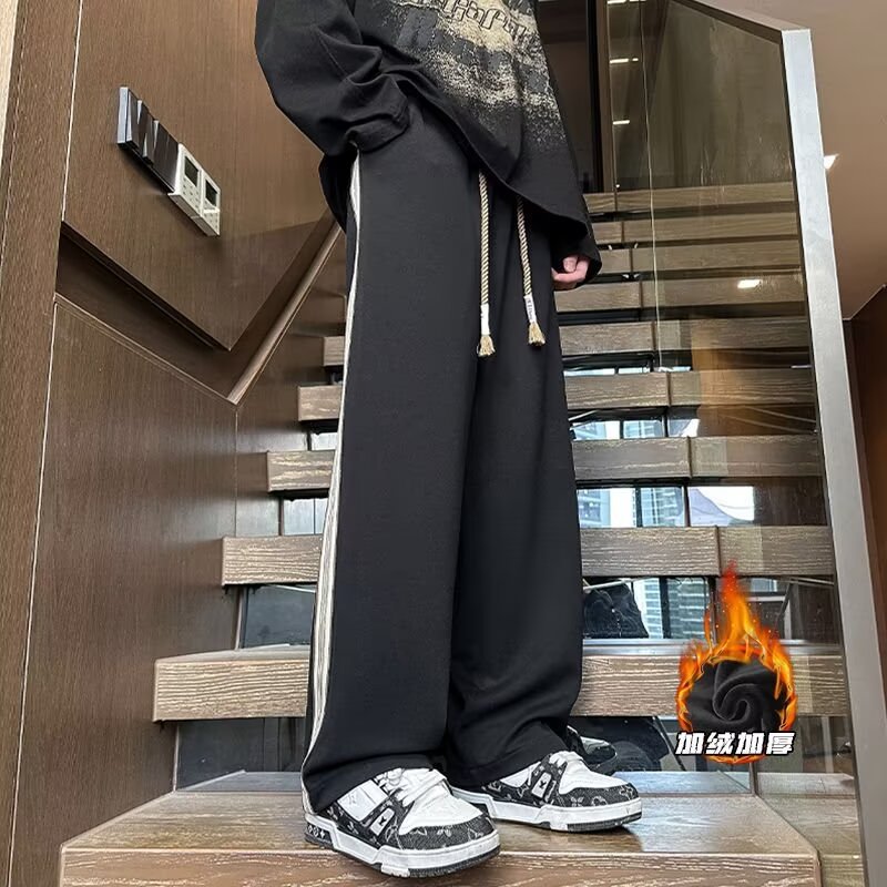 Pantalones de banda de tejido espesa de veludo para hombres pantalones de cauda vertical holgados, pantalones casuales de moda estadounidenses de otoño y invierno