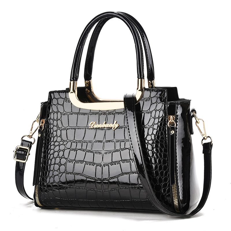 2026 nueva moda esmaltada cocodrilo estampado bolso transfronterizo mujer universal viaje de gran capacidad mochila de hombro