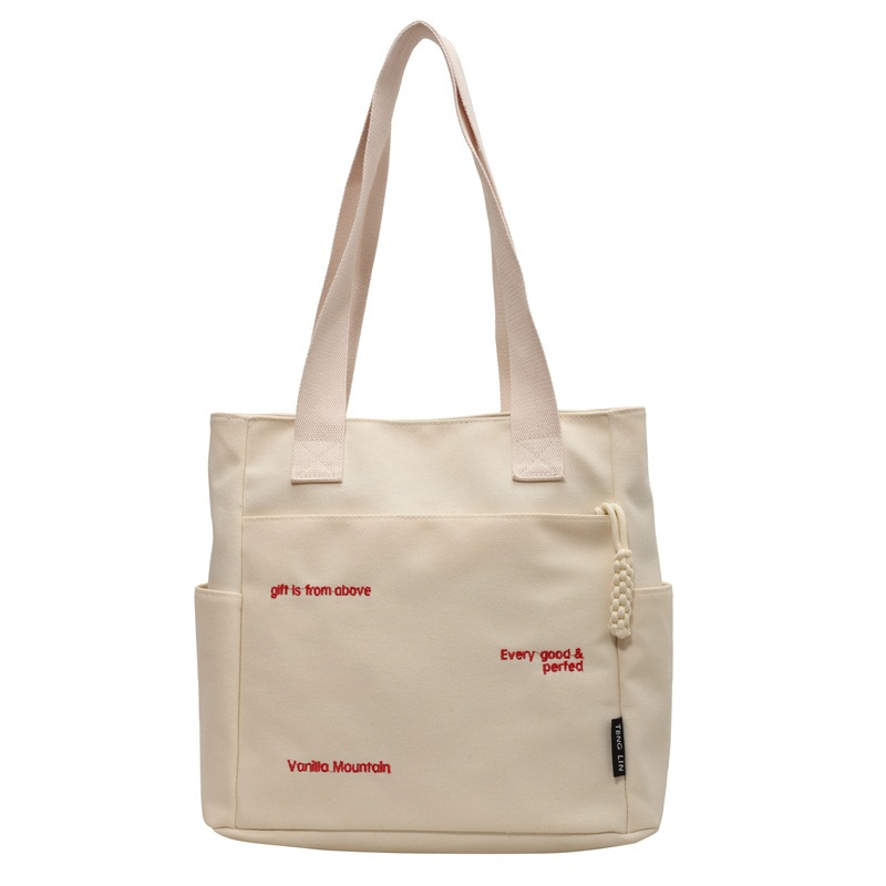 Bolsa de mano ligera para mujeres en clase de hombro único bolso de lienzo con cremallera de estilo coreano