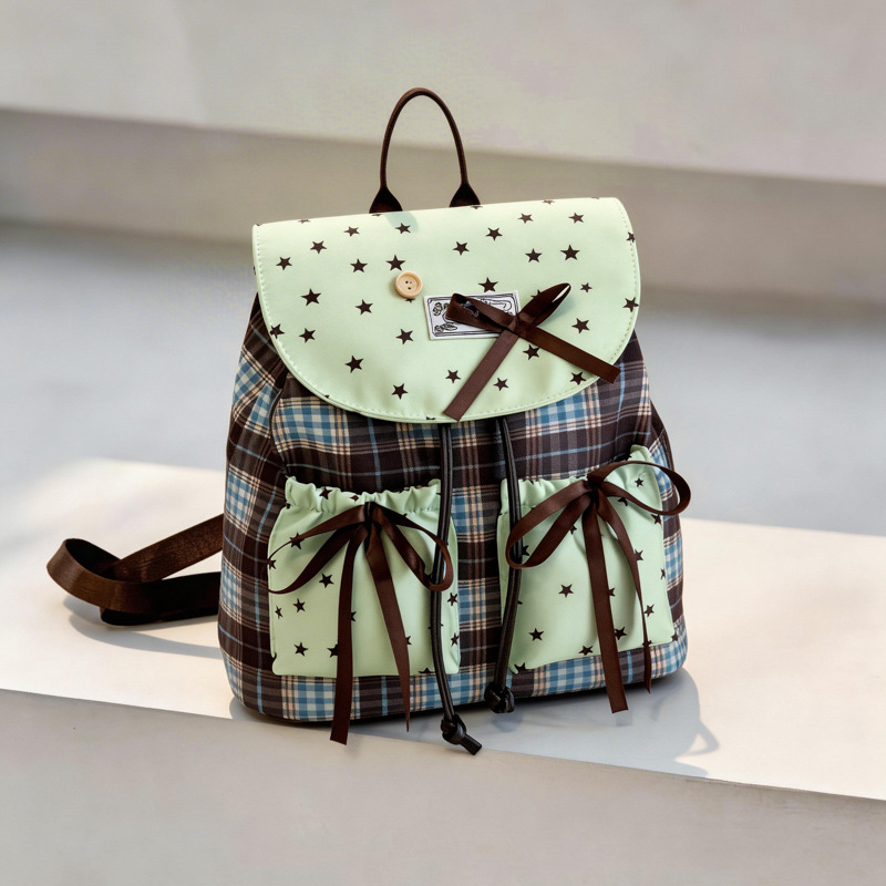 Mochila de estilo universitario de mujer nicho mochila 2026 nueva mochila simple a cuadrillas de viaje bolsa de estilo británico de mujer