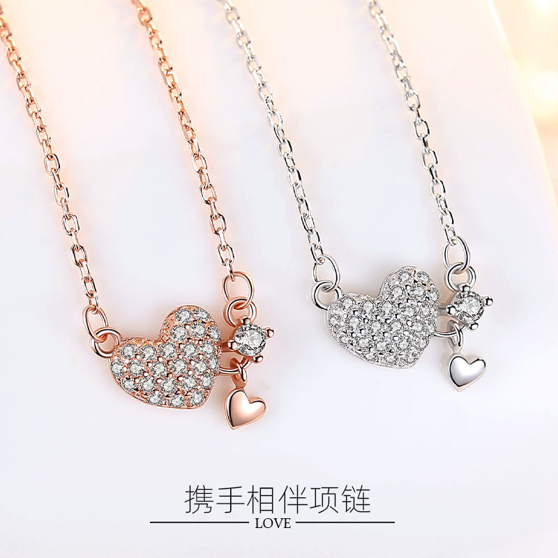 En línea de la celebridad de Singapur S925 plata esterlina en forma de corazón collar de diamantes colgante nicho simple diseño amor melocotón clavícula cadena femenina