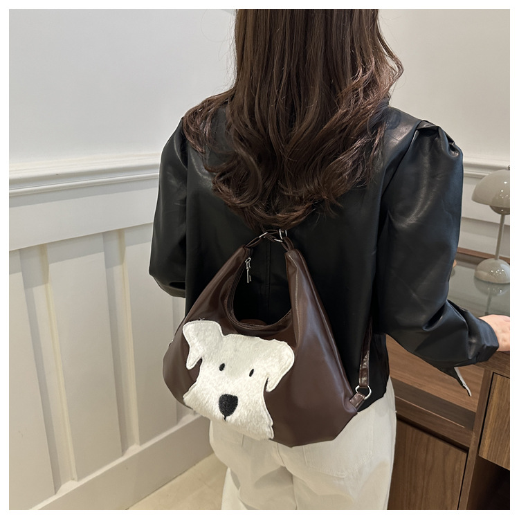 The new autumn and winter 2024 fashion cartoon backpack with simple, individual and niche design, single-shoulder bag and commuter tote bag undefined