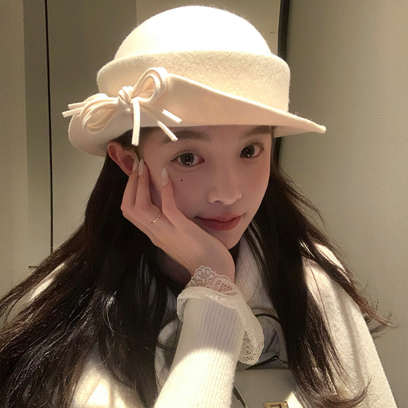 Hepburn estilo elegante sombrero de lana de invierno mujeres temperamento alto sentido sombrero de pescador de punto caliente sombrero de oro universal