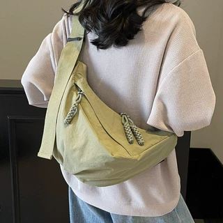 高颜值休闲新款斜挎包女2025通勤大容量时尚运动饺子包外出单肩包