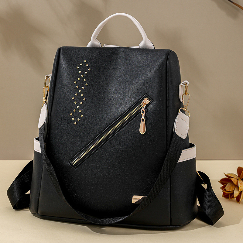 Mochila de cuero suave para mujer antirrobo transfronteriza 2024 nueva mochila de viaje al aire libre para jugar práctica mochila escolar de gran capacidad