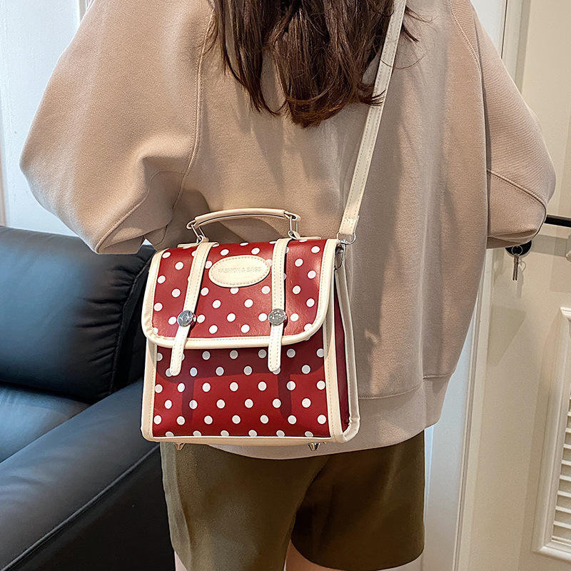 Mochila de estudiantes de ondas coreanas para mujeres 2024 nueva moda alta sensación de nicho de moda mochila de viaje