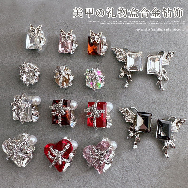 Uñas de uñas, joyas de diamantes de pila terminadas, caja de regalo de diamantes, corazón torcido de mariposa, joyas de cristal de oro, diamantes de uñas