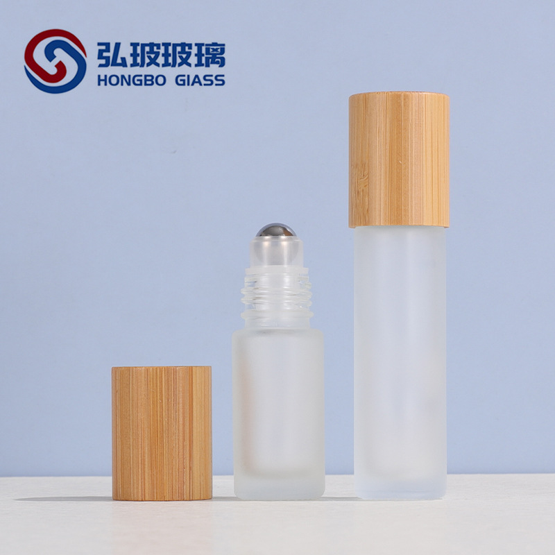 Cubierta de bambú botella de bola de rodillo 10ml botella de cuentas botella de perfume de vidrio sub-botella 5ml botella de aceite esencial letras láser en stock