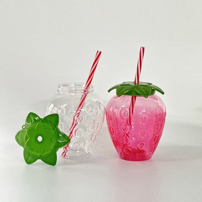 Fábrica directa en línea popularidad explosiva PET500ML taza de fresa viento taza de piña de dibujos animados taza de frutas de paja creativa taza