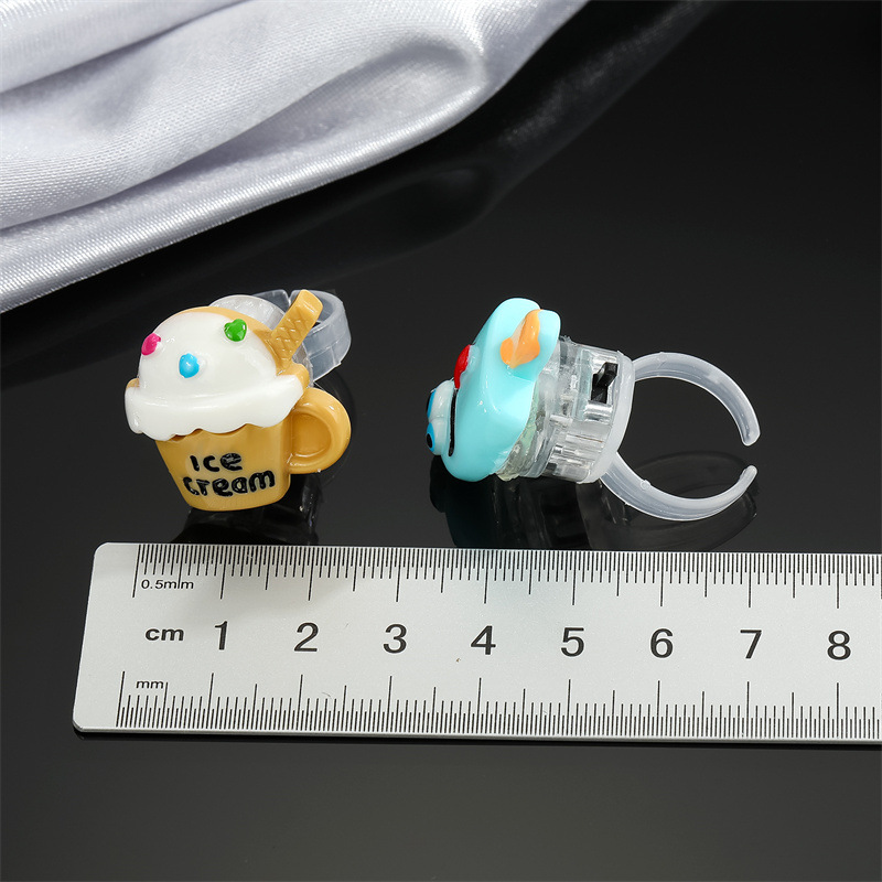 Cross-border Cute Cake Luminous Ring Creative Cartoon Children's Toy Ring Adjustable Index Finger Ring display picture 1