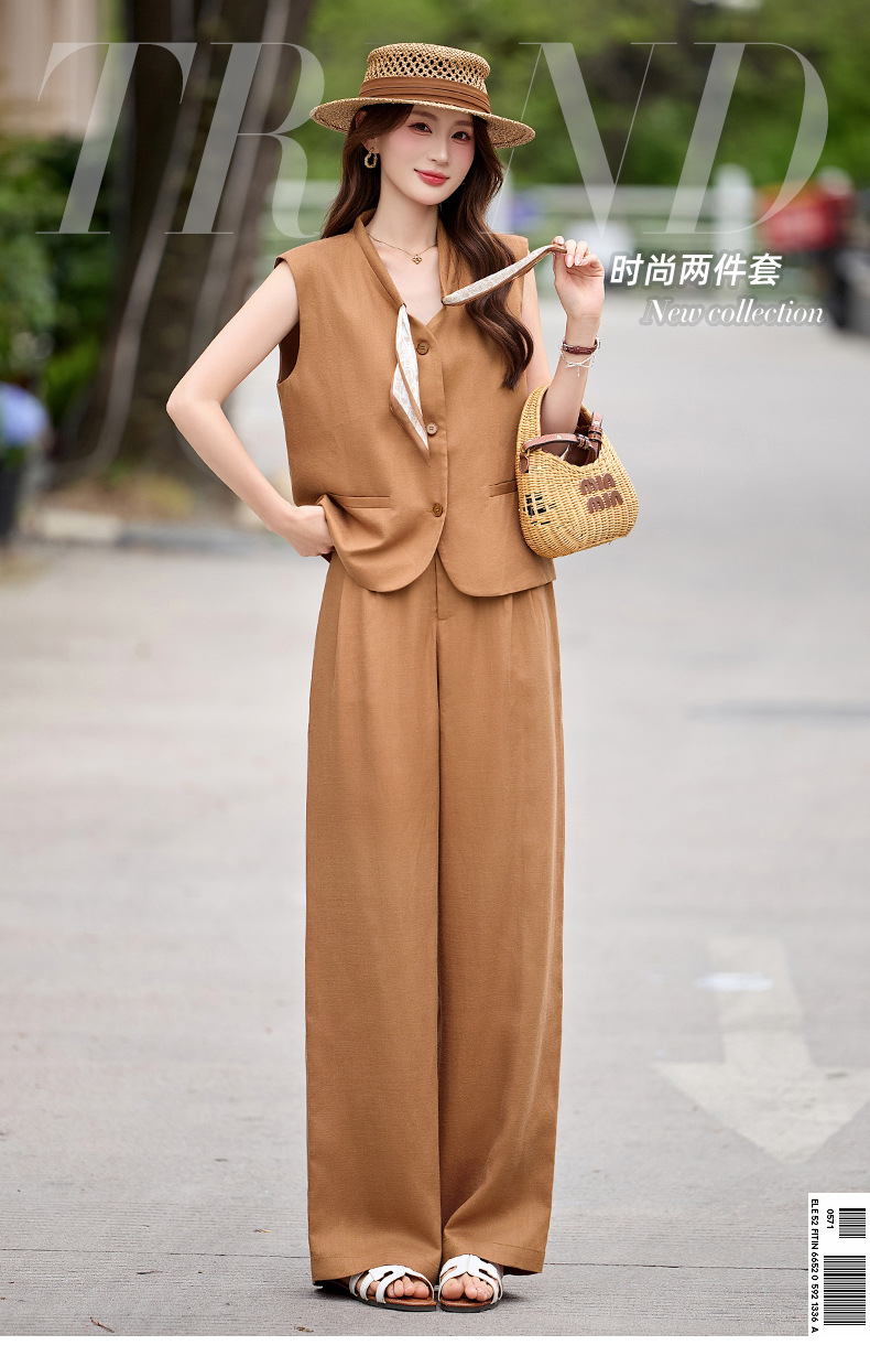 Bộ vest nữ gồm áo gile và quần tây ống đứng cạp cao — màu đen, màu cam, màu trắng ngà chi tiết 1