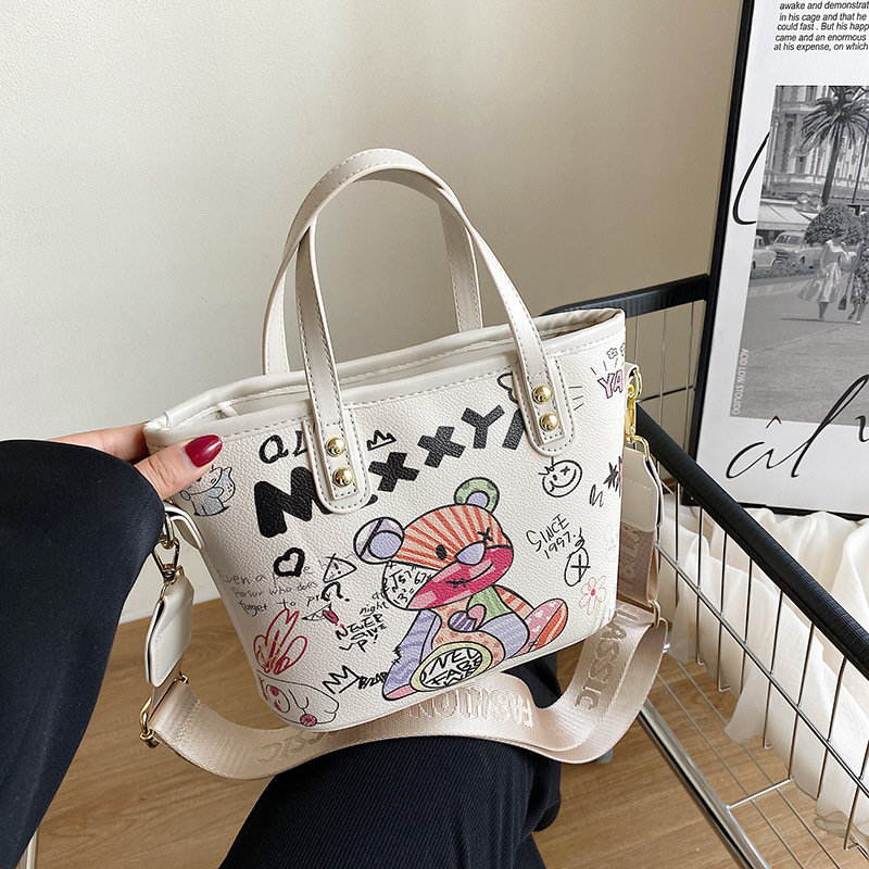 Handbag large capacity women all match personality graffiti shoulder bag fashion cartoon bucket bag_voghion.com