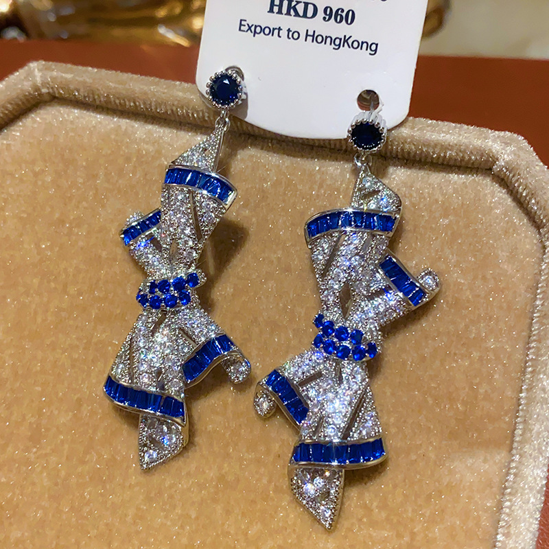 Oro real arco de perlas de aretes
