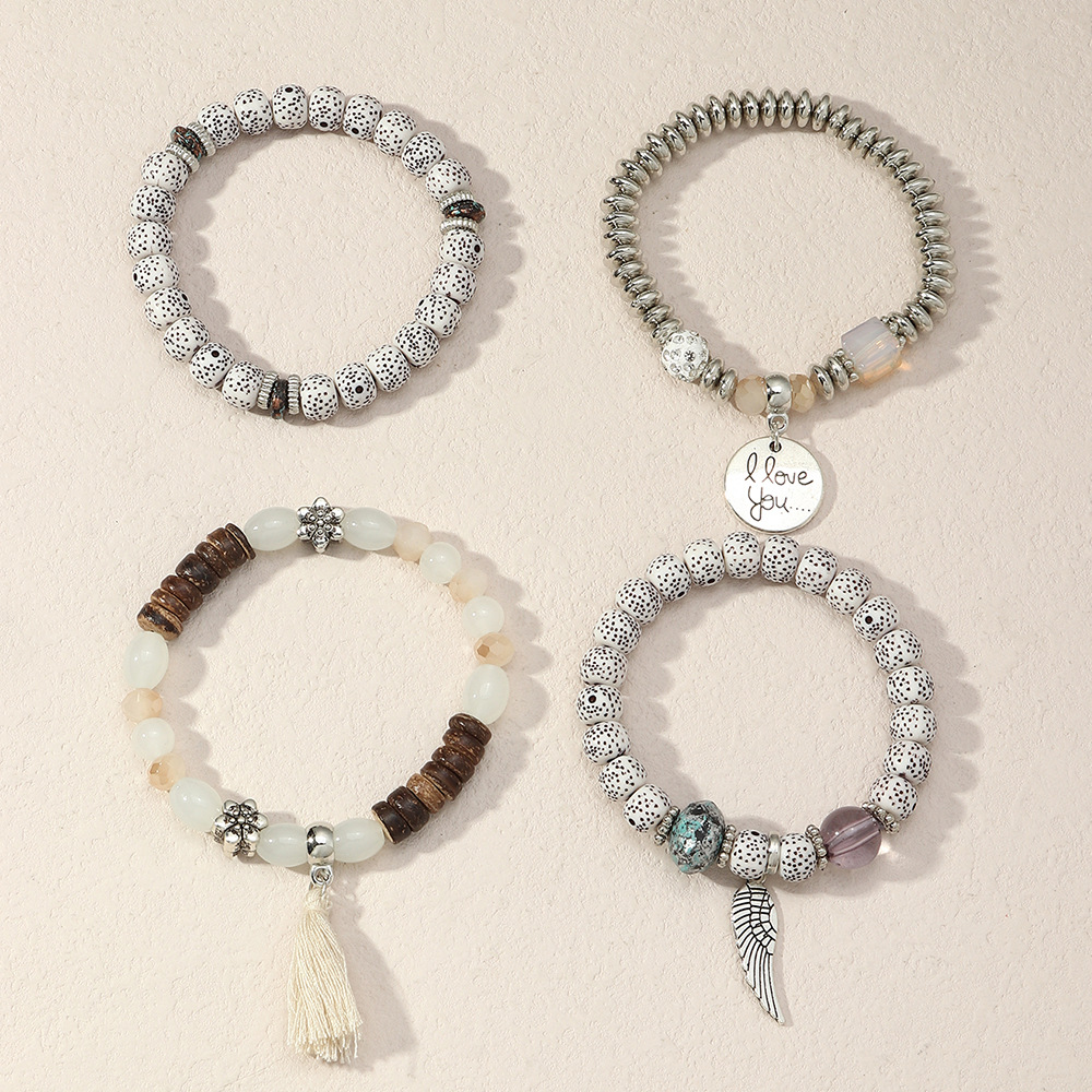 Modisches Graues Risssteinperlen-mischfarben-rundes Quastenarmband display picture 4