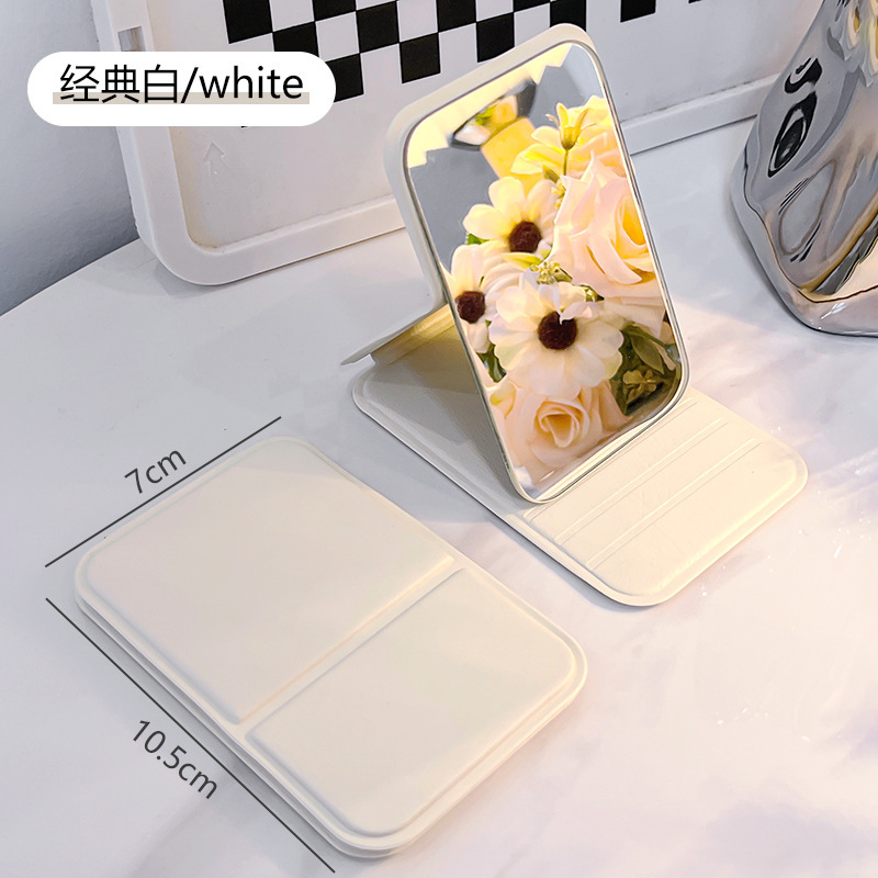 Espejo de maquillaje Espejo plegable en el viento alto valor facial Fairy estudiantes portátiles con mini espejo