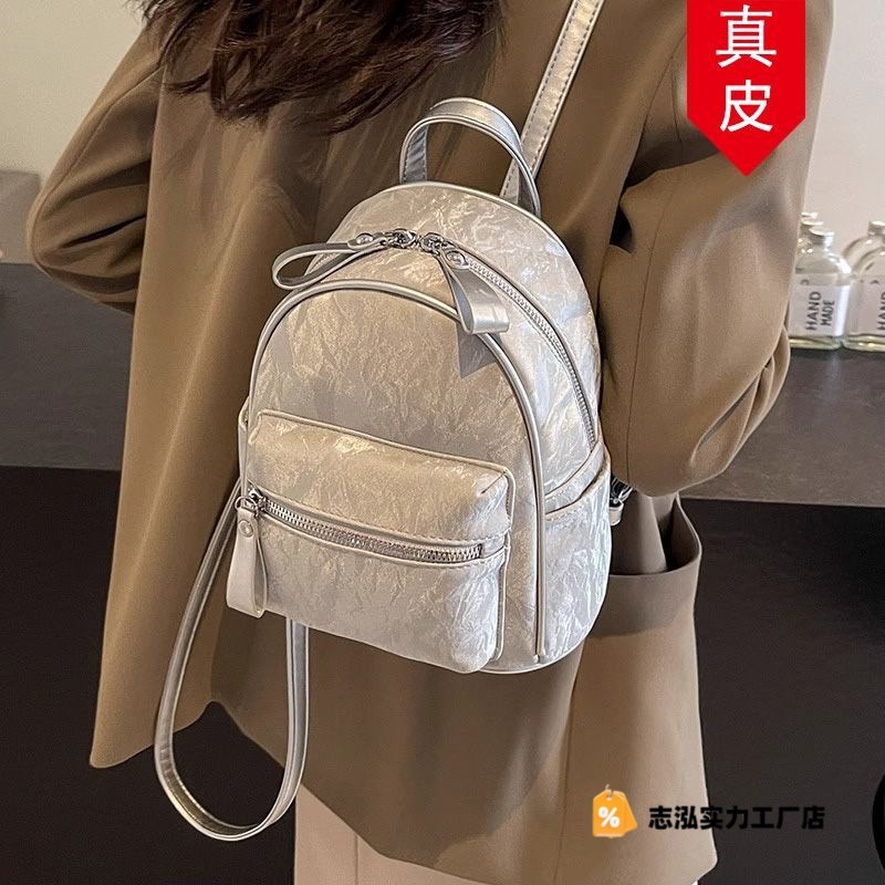 香港代购真皮大学生包包女新款夏季双肩包简约百搭可爱通勤包