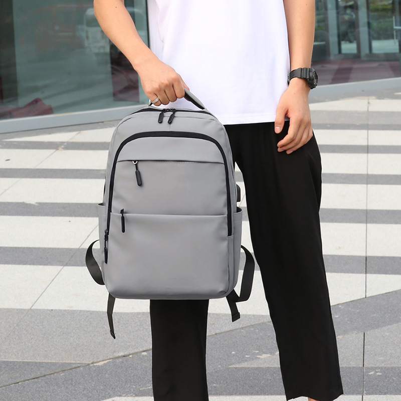 Transfronterizos primavera y verano nuevo estilo simple ocio mochila de hombro de hombre mochila de gran capacidad mochila USB de escuela secundaria mochila universitaria