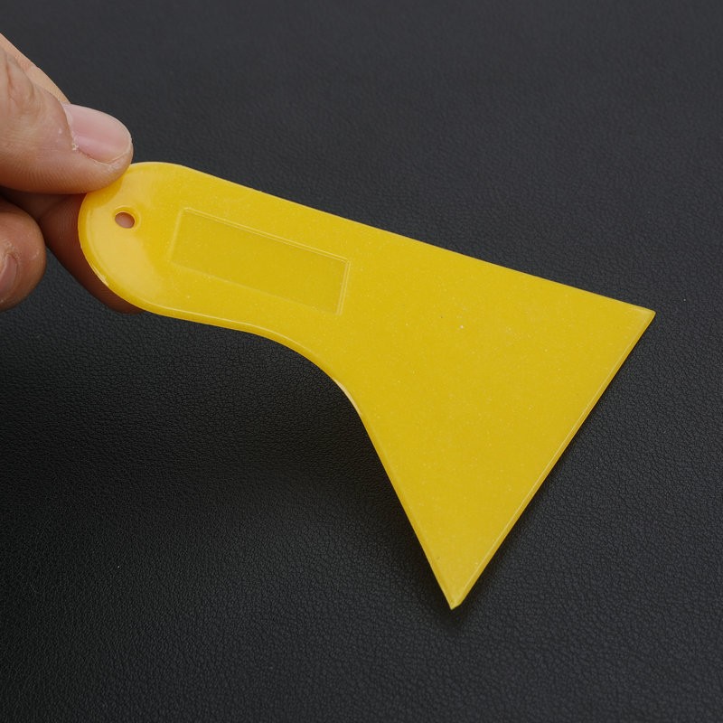 Thickened triangular scraper