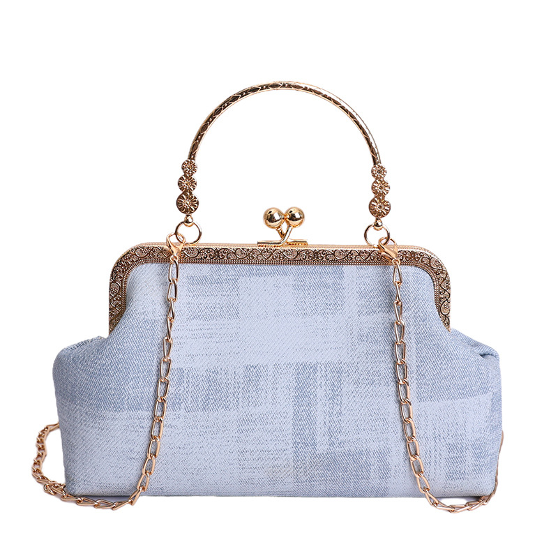 2026 nuevo pequeño viento de cadena bolsa de cena de mujeres de alto nivel sensación abrazadera bolso de mano mochila de estilo de moda bolsa de conchas