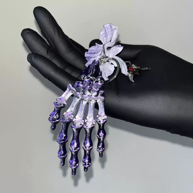 Dark Gothic Purple Skull Hand Bone Keychain Pendant with Exaggerated Design for European and American Niche Style Gothic Bags Dark Gothic Purple Skull Hand Bone Keychain Pendant with Exaggerated Design for European and American Niche Style Gothic Bags