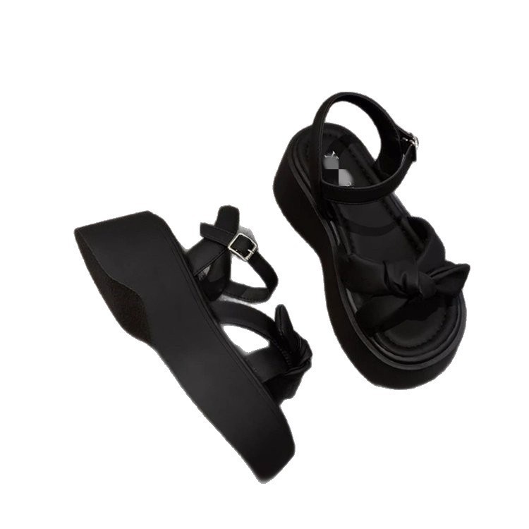 Sandalias de fondo grueso para mujeres verano 2026 nuevo arco francés retro con falda casual zapatos de playa romanos