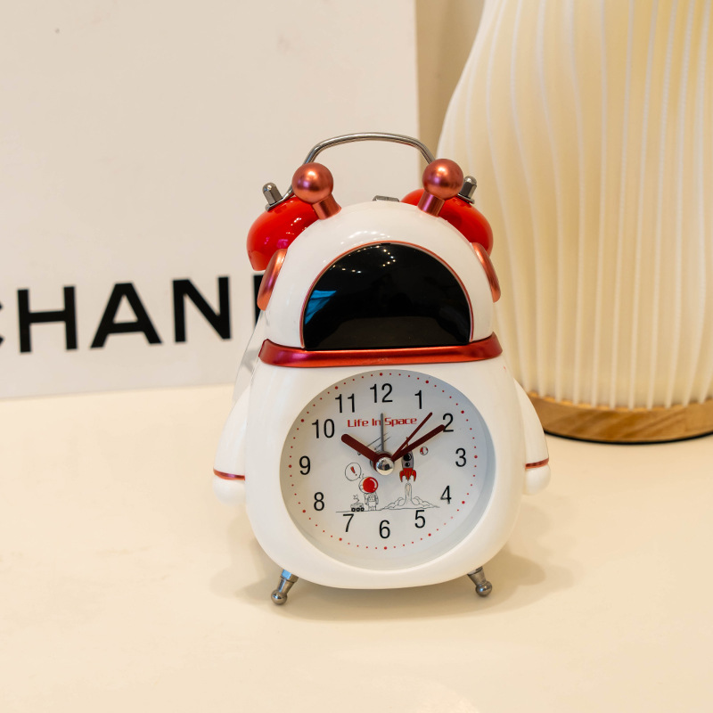 Venta directa de fábrica astronauta pequeño reloj de alarma niños reloj despertador estudiante especial despertador artefacto dibujos animados reloj de alarma de escritorio
