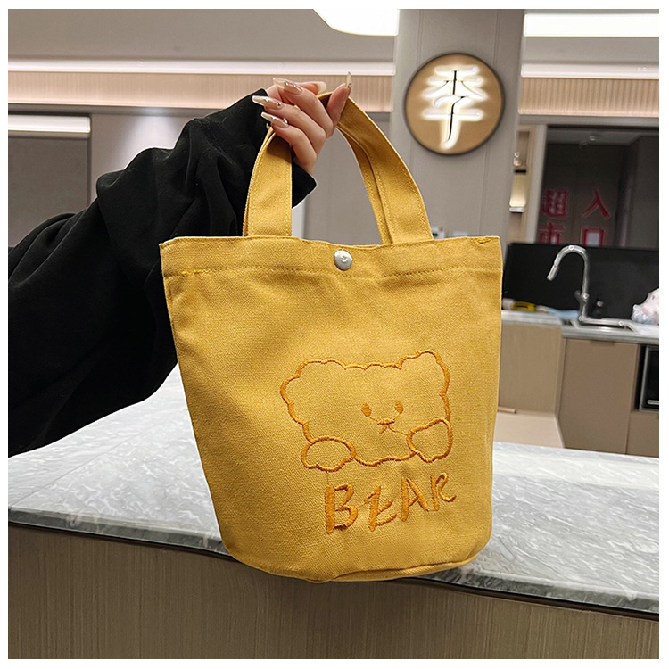 Personalized ladies' bucket bag, versatile and cute canvas bear wholesale, simple Japanese style new handbag undefined