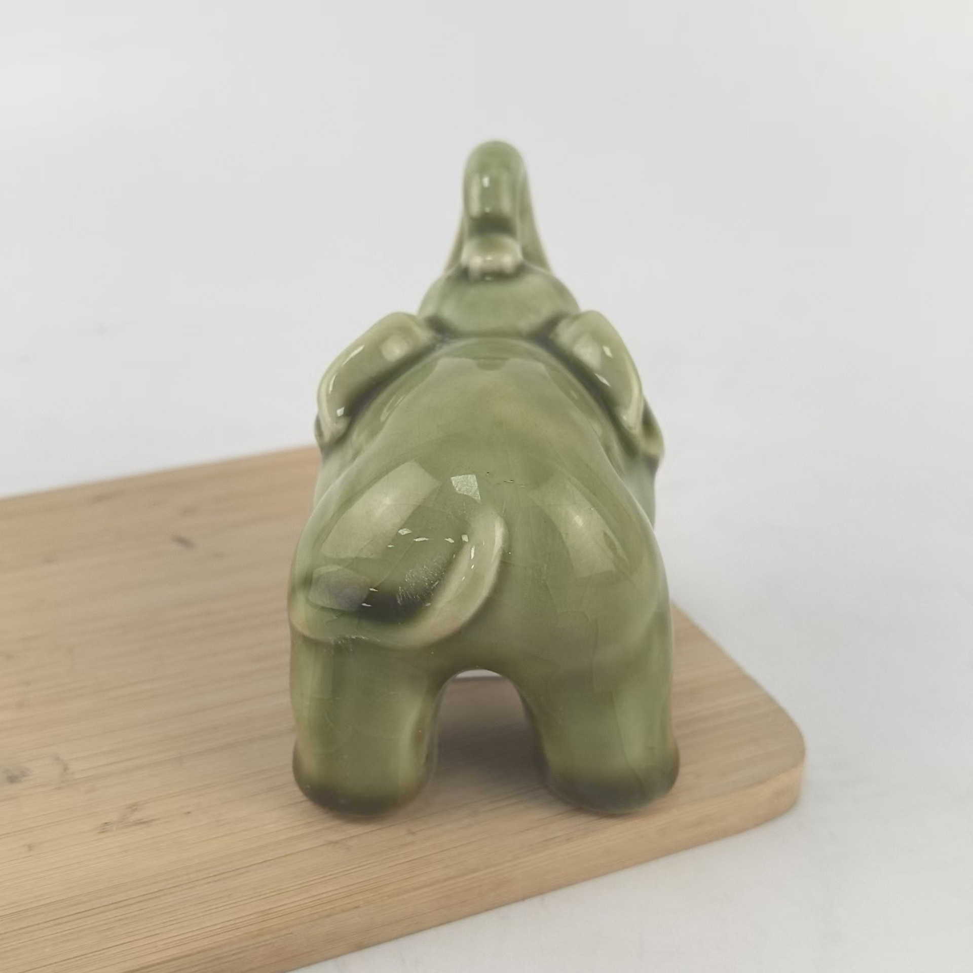 Decoración de mesa de cerámica mini-elefante personalizada segura como una imagen exquisita puede cultivar una mesa de té de cerámica para girar