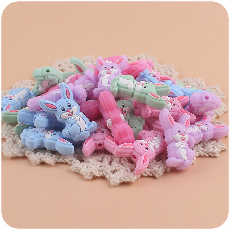 Nuevo bebé suministros conejo de dibujos animados cuentas silicona lindo creativo chupete cadena pulsera juguete mordedor Accesorios
