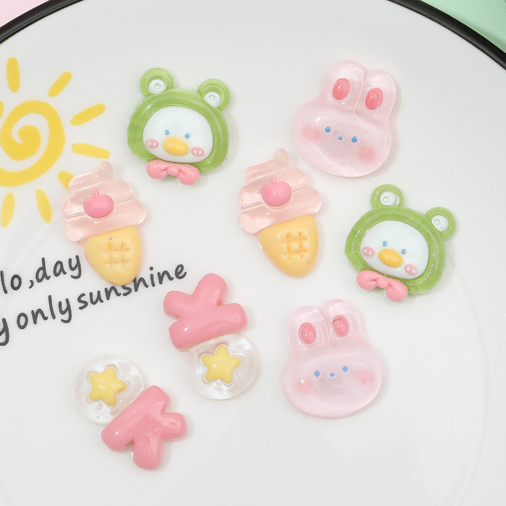 Rosa de dibujos animados conejo congelado DIY accesorios de resina crema pegamento caja del teléfono accesorios para el cabello clip de oído material de parche al por mayor