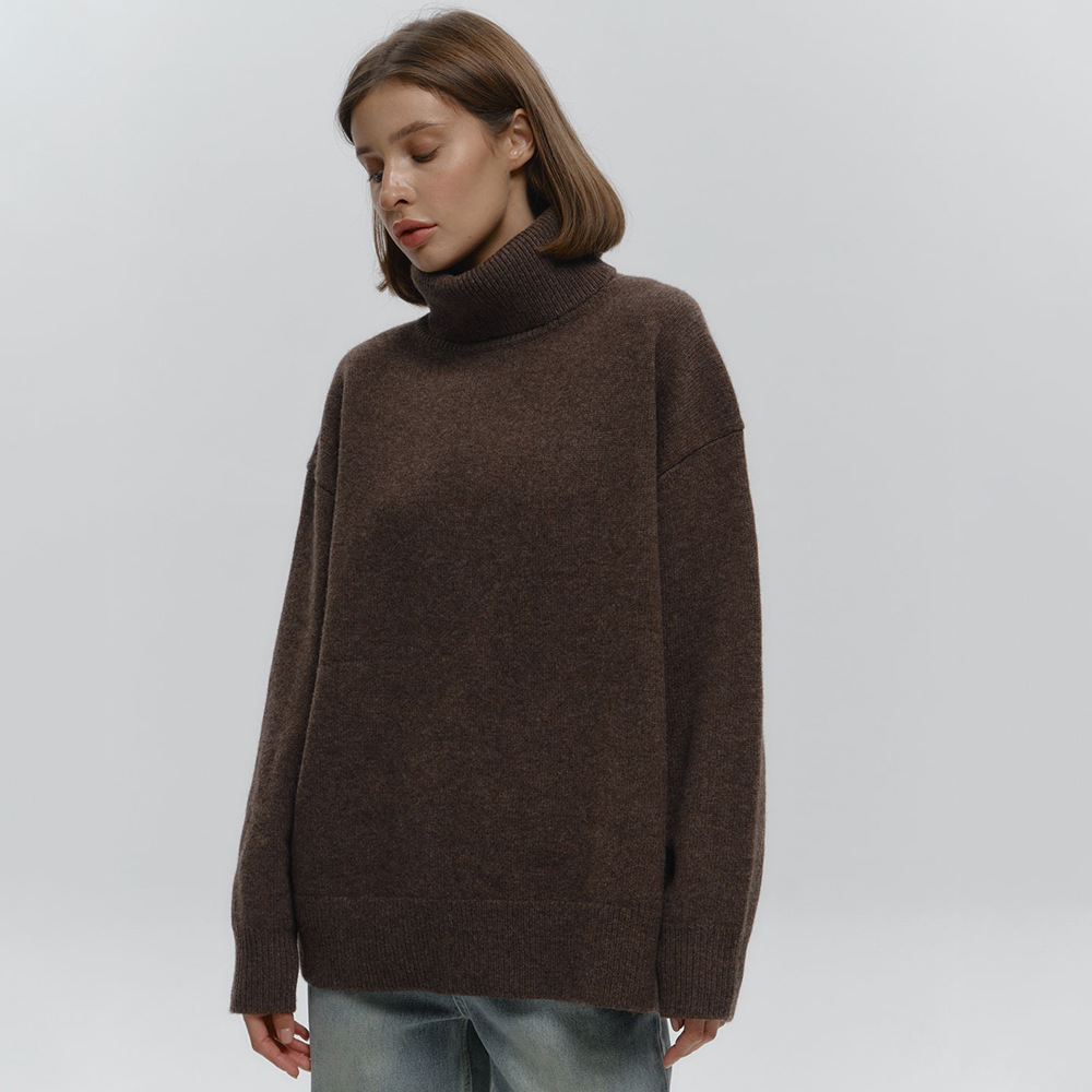 Suéter suelto de cuello alto transfronterizo Europa y los Estados Unidos 2025 otoño y invierno nuevo simple camisa de punto de color sólido abrigo abrigo suéter de cabeza mujer