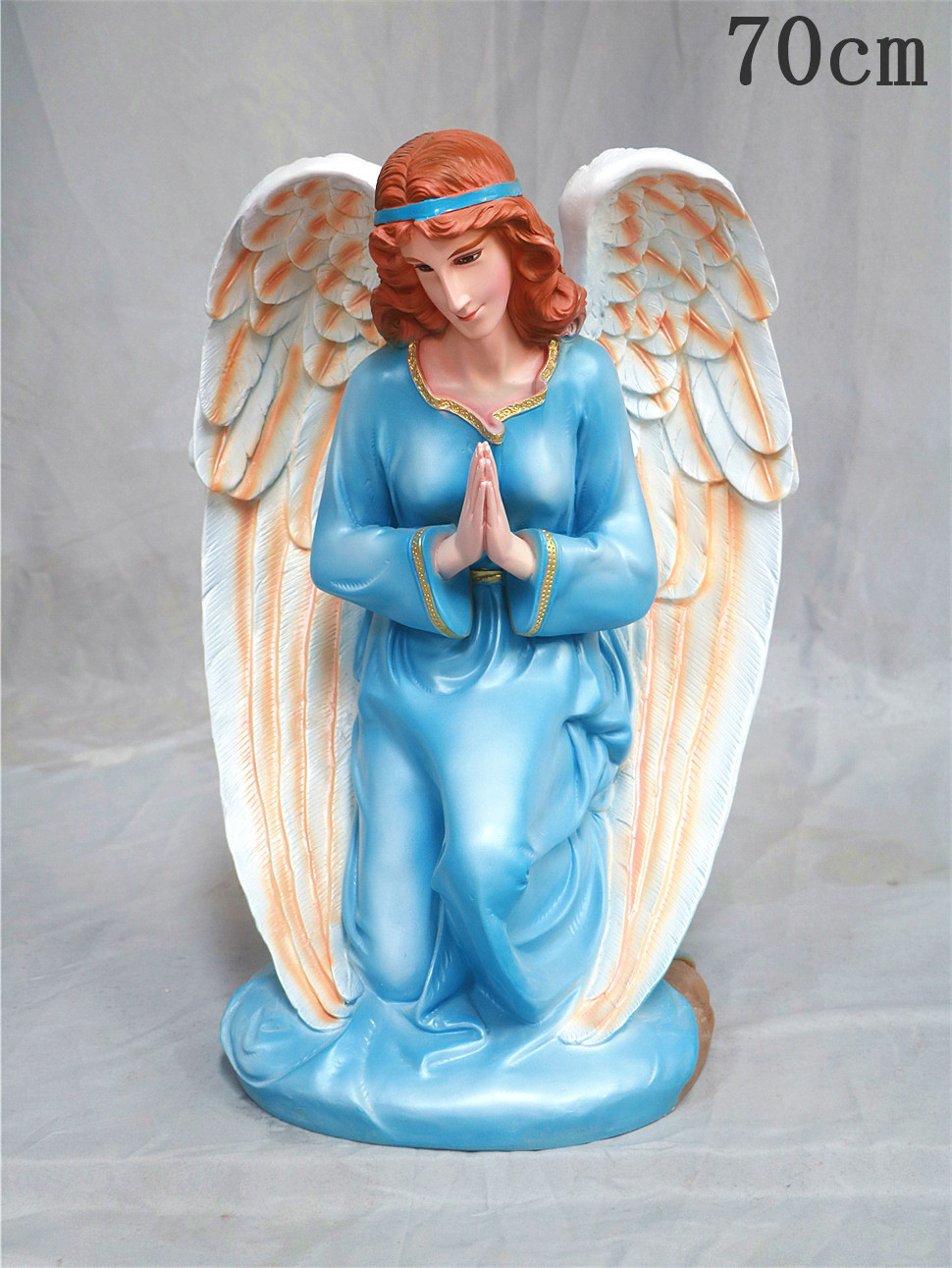 70cm de rodillas ángel mano