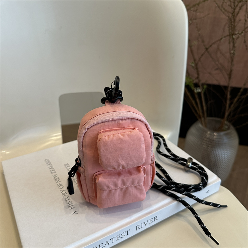 Mini colgante bolso de cambio 2025 nuevo cross-border nylon impermeable bolso de auriculares de bolsillo de hombro