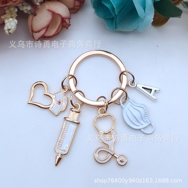 Joyería de comercio exterior de Europa y América 26 cartas médico enfermera personal jeringa estetoscopio máscara llavero