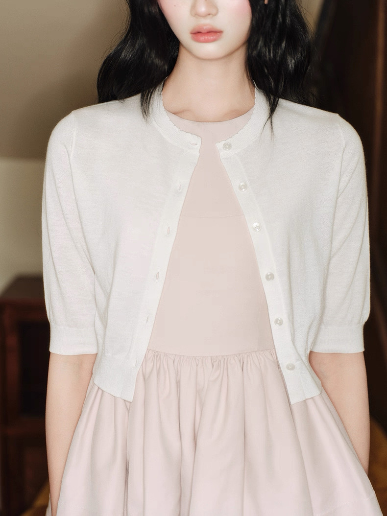 Cardigan with a round collar