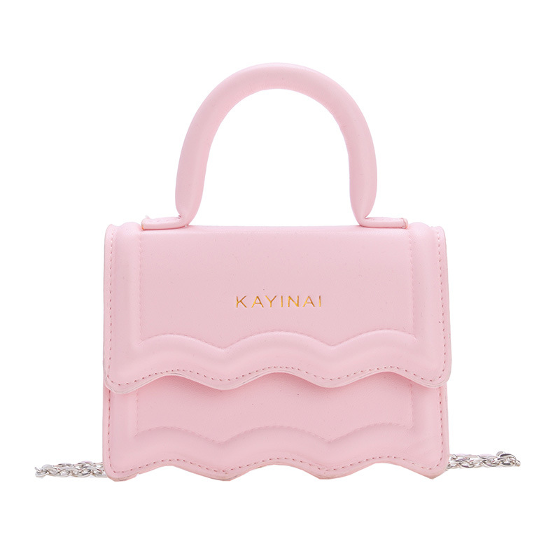 Bolso bandolera de niña coreana moda color sólido estilo occidental mini bandolera para niños verano nuevo alfabeto bolso para niños